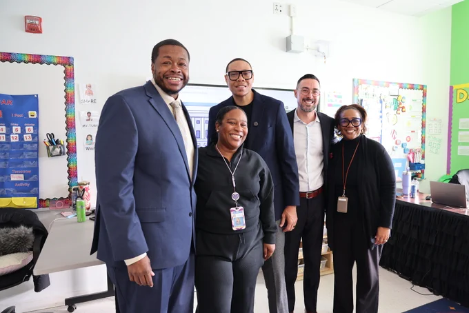 Chancellor Ferebee poses with Ms. Marbury, Principal Branch and AP Moore of Beers, and Jim Kline, President & Executive Director of the Ed Fund.