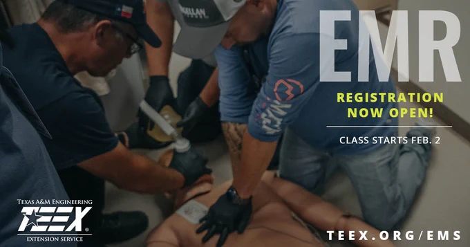 students practice chest compressions on a manakin