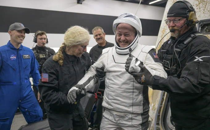 NASA astronaut Mike Fincke helped out of the SpaceX Dragon Endeavour spacecraft onboard the SpaceX recovery ship SHANNON after he, NASA astronaut Zena Cardman, JAXA (Japan Aerospace Exploration Agency) astronaut Kimiya Yui, and Roscosmos cosmonaut Oleg Platonov landed in the Pacific Ocean off the coast of Long Beach, Calif., Thursday, Jan. 15, 2026. Cardman, Fincke, Yui, Platonov are returning after 167 days in space as part of Expedition 74 aboard the International Space Station. Photo Credit: (NASA/Bill Ingalls)