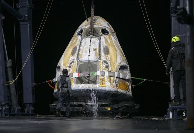 Support teams onboard the SpaceX recovery ship SHANNON work around the SpaceX Dragon Endeavour spacecraft shortly after it landed with NASA astronauts Zena Cardman, Mike Fincke, JAXA (Japan Aerospace Exploration Agency) astronaut Kimiya Yui, and Roscosmos cosmonaut Oleg Platonov aboard in the Pacific Ocean off the coast of Long Beach, Calif., Thursday, Jan. 15, 2026. Cardman, Fincke, Yui, Platonov are returning after 167 days in space as part of Expedition 74 aboard the International Space Station. Photo Credit: (NASA/Bill Ingalls)