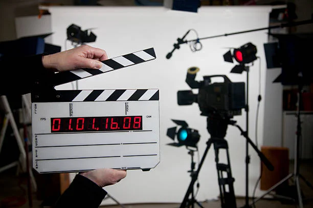 film set with camera and take slab
