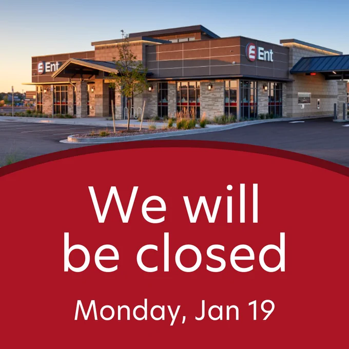 Image of an Ent Credit Union branch building during sunset with a notification overlay stating 'We will be closed Monday, Jan 19.'