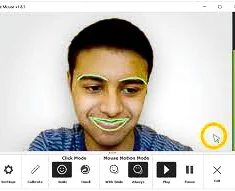 A young person uses facial recognition software with green lines highlighting their facial features. They're smiling, with an interface displaying various icons below.