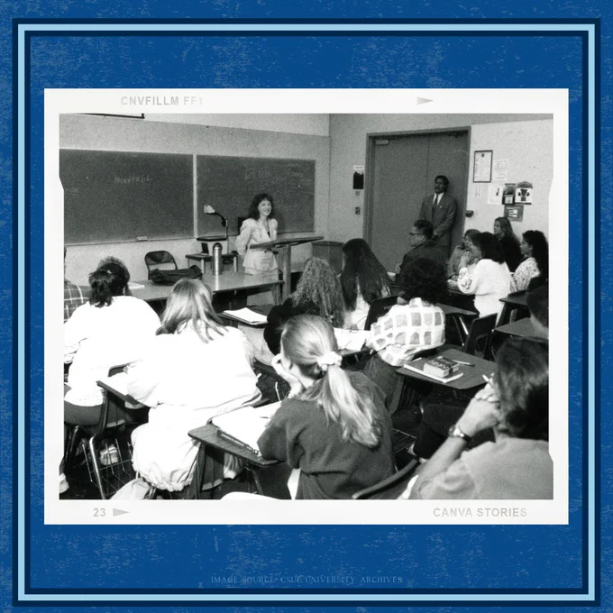 students listening to a guest speaker in a classroom in 1995