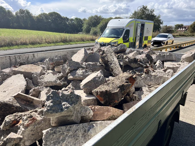 Overloaded light goods vehicle and insecure load which should be sheeted or netted