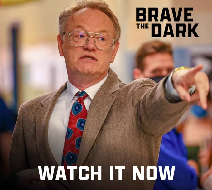 Jared Harris as teacher Stan Deen, in a school corridor, pointing with authority.
Text says Brave the Dark, Watch it now