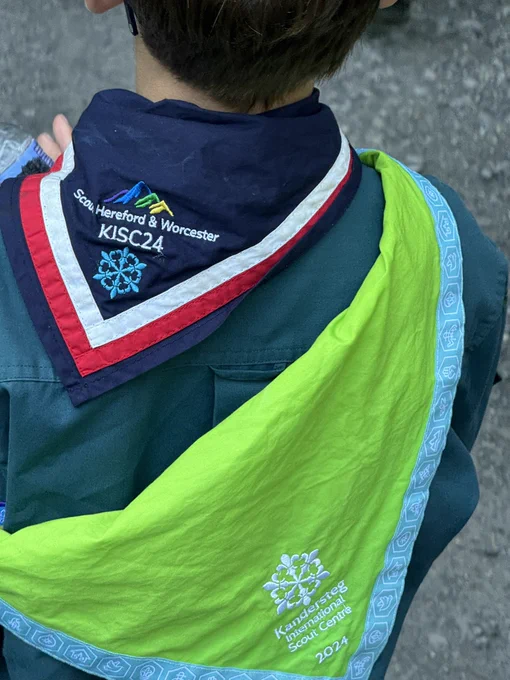 Scout wearing two Neckerchiefs,
one is Scouts Hereford & Worcester, KISC24
the second is for Kandersteg International Scout Centre