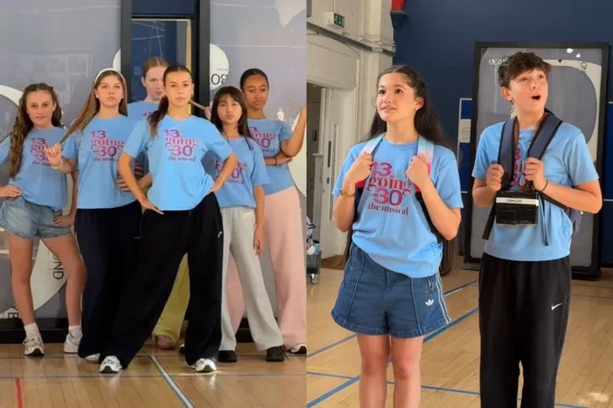 Six young girls in a triangle formation giving attitude with hands on hips, and two young, timid kids hold the straps of their backpacks and gaze dreamily