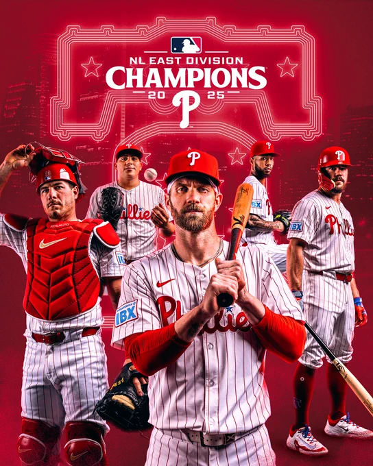 2025 NL East Division Champions graphic. Cutouts of Bryce Harper, Kyle Schwarber, J.T. Realmuto, Ranger Suárez and Cristopher Sánchez are included over a red background with the Citizens Bank Park bell and the Philadelphia skyline.