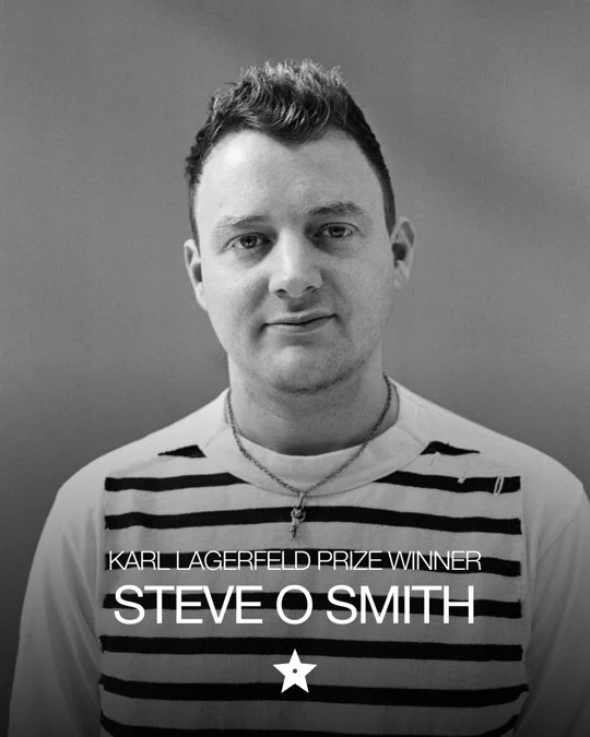 Black-and-white portrait of Steve O Smith, winner of the Karl Lagerfeld Prize, looking at the camera.