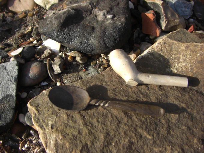Clay pipe and old spoon discovered on the River Thames foreshore by Thames Explorers