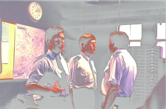 PC Jim Carver (Mark Wingett) receives a dressing down from Sgt Jack Wilding (Peter Dean) in Woodentop, the pilot of The Bill. Also pictured is Gary Olsen as PC Dave Litten.

Photograph: Fremantle Media