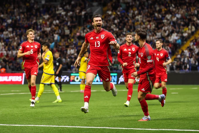 Kieffer Moore celebrates against Kazakhstan.