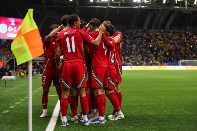 Kieffer Moore celebrates against Kazakhstan.