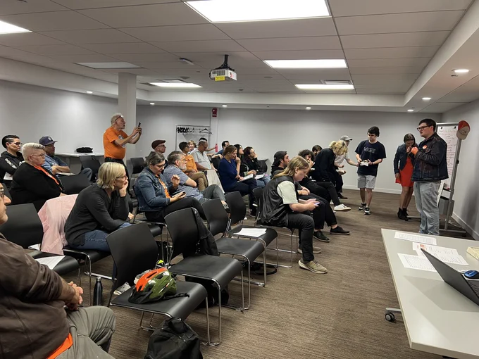 NDP members in a meeting room