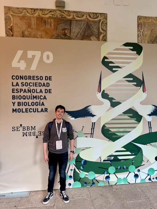 Standing with the official 47th SEBBM Congress poster.