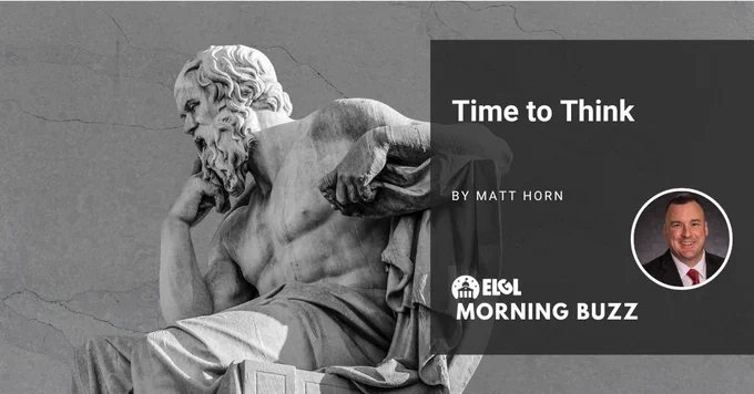 Gray scale of a statue of the philosopher Socrates. He is sitting, wearing a toga from the waist down, and holds one hand at his chin. An overlay gives information about the accompanying article: the title, "Time to Think;" the author, "By Matt Horn;" and the author's headshot and the ELGL Morning Buzz logo.