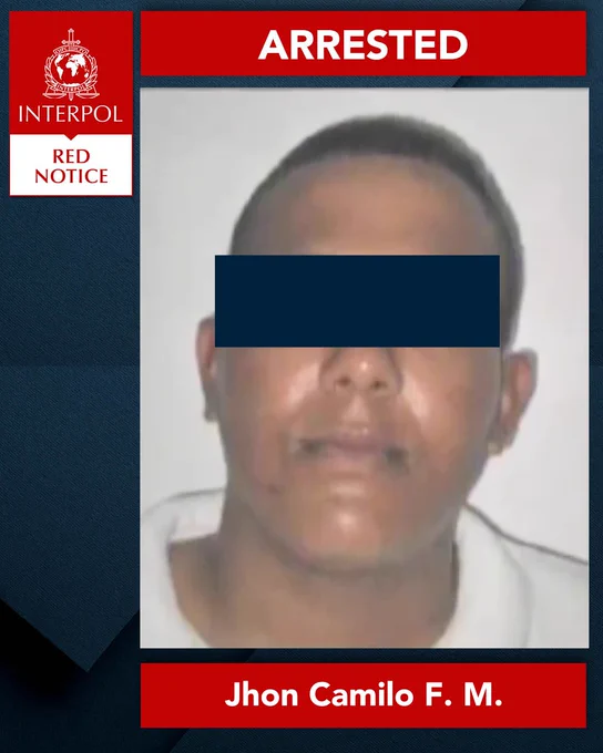 INTERPOL Red Notice poster with the word 'ARRESTED' displayed at the top. Features a photo of an individual named Jhon Camilo F.M.