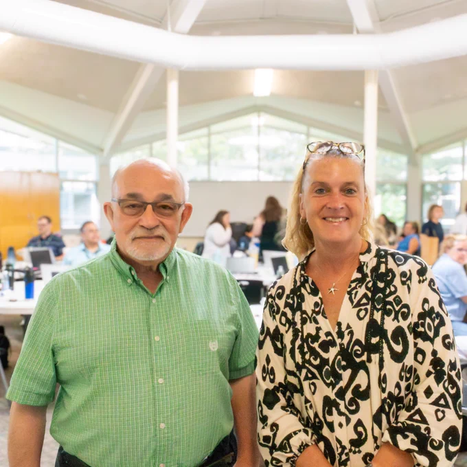 Two Marlborough School Committee members pose for a group photo in the Whitcomb Commons.