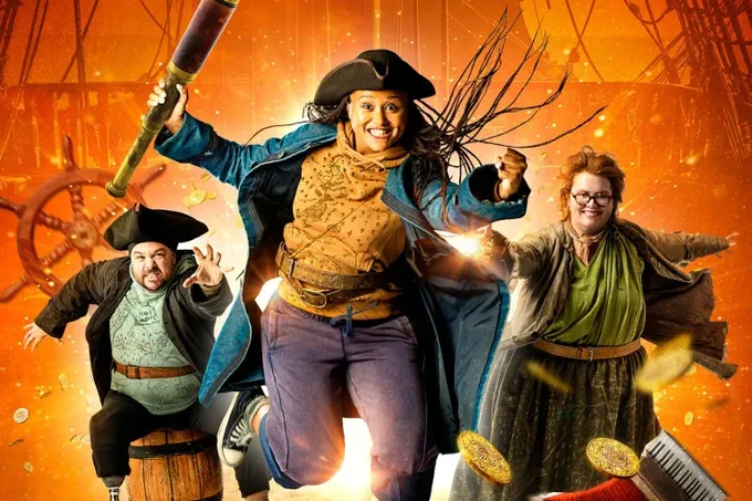 Colin Leggo, Adryne Caulder James and Jayde Adams for Treasure Island leap in the air dressed as pirates