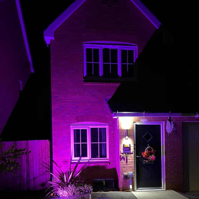 buildings lit up purple for pancreatic cancer awareness