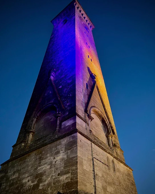 buildings lit up purple for pancreatic cancer awareness
