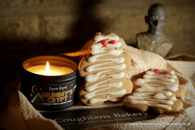 Coughlans "Mummy" Gingerbread with a Regions Beyond candle and a bust of The Mummy from the Universal Monsters films.