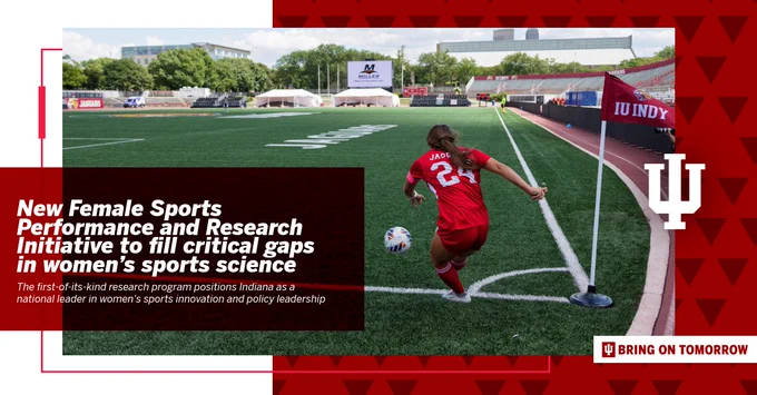 An athlete from Indiana University kicks a soccer ball on a field, promoting the new Sports Performance and Research Initiative.