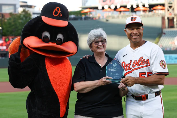 Anthony Sanders is presented the 2025 Oriole Way Award during a pregame ceremony at Oriole Park.