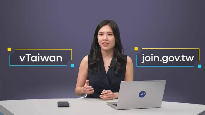 Joyce Tseng gesticulates while introducing Taiwan Model pillars vTaiwan and join.gov.tw during the TaiwanPlus program small island BIG IDEAS featuring Audrey Tang, Taiwan’s cyber ambassador, first digital minister and architect of the Taiwan Model of digital diplomacy.