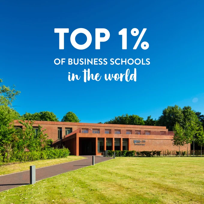 Image shows Queen's Business School's Student Hub. Over the sky, there is text that reads: TOP 1% OF BUSINESS SCHOOLS IN THE WORLD