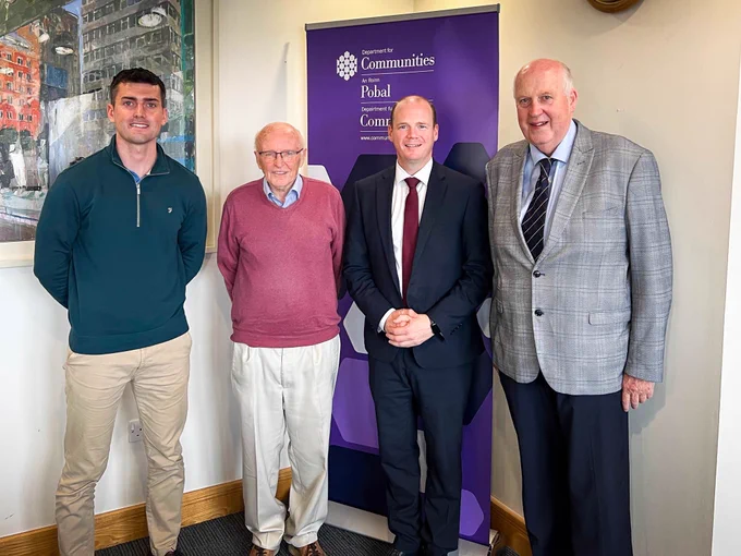 Minister Lyons photographed with representatives from 2&4 Wheel Motorsport.