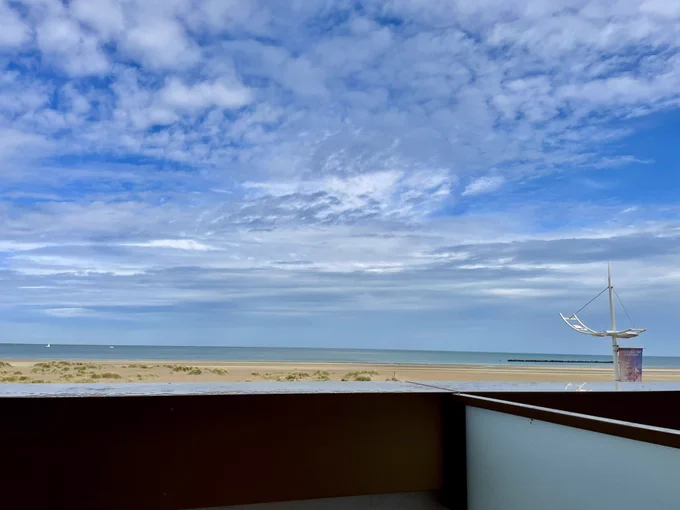 View from a balcony on a beach and the sea in the background