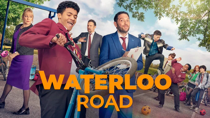 A boy on a bicycle is doing a wheelie in school uniform and a group of kids mess around on the playground while teachers watch on