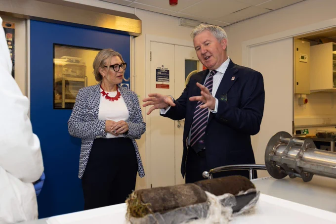 Professor Bill Austin describes the work being done in the laboratory to Climate Action Secretary Gillian Martin 