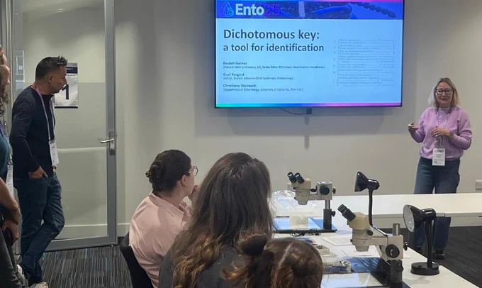 Beulah Garner presenting the Dichotomous key, a tool for identification, to a room of delegates