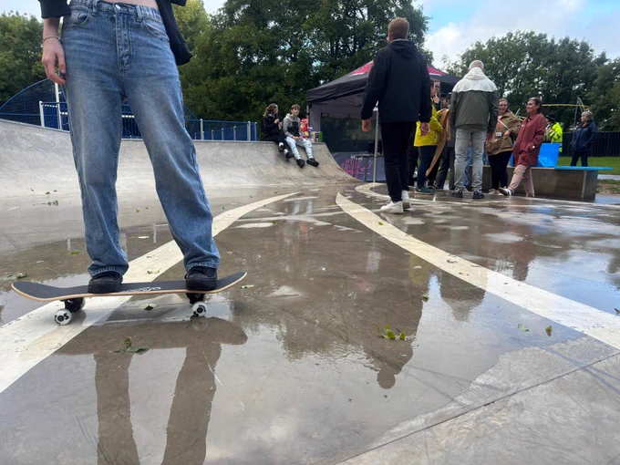 A young person on a skateboard at the new skatepark
