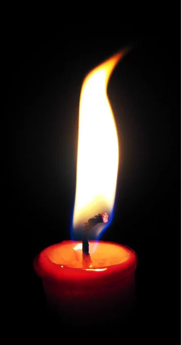 Candle lit by a Senior Mental Health Practitioner.