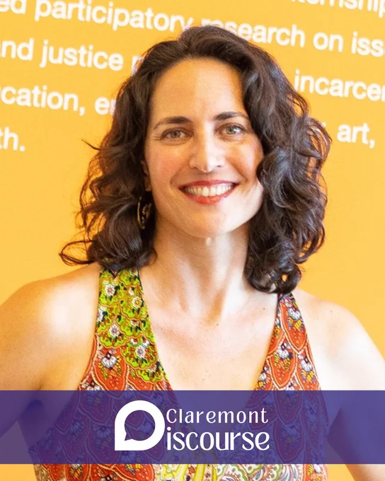 Photo of Dr. Peterson with the Claremont Discourse logo at the bottom