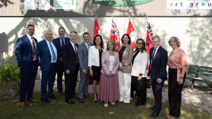 Federal and provincial representatives and partners at the Elmwood–East Kildonan Active Living Centre.