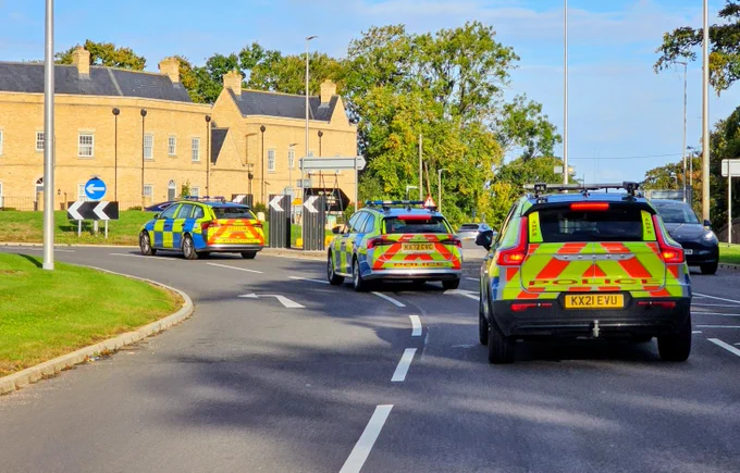Convoy of 3 marked police vehicles in Towcester