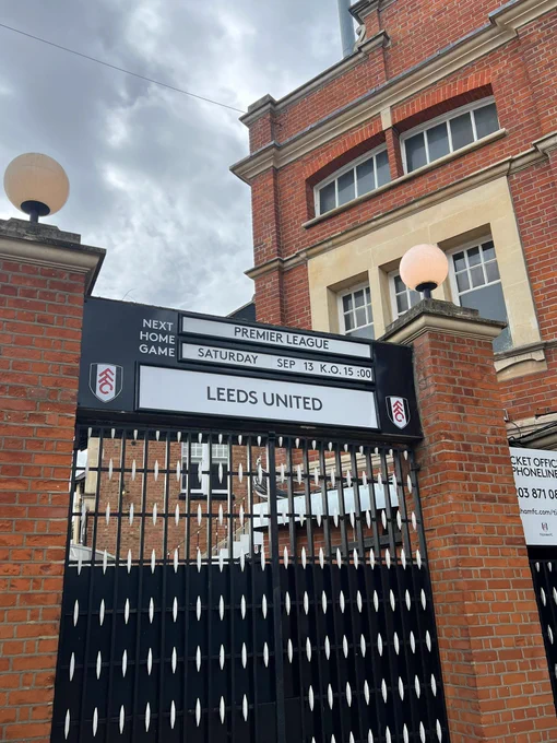 Photo of the fulham board outside the Stadium and Cottage showing Leeds United on the board