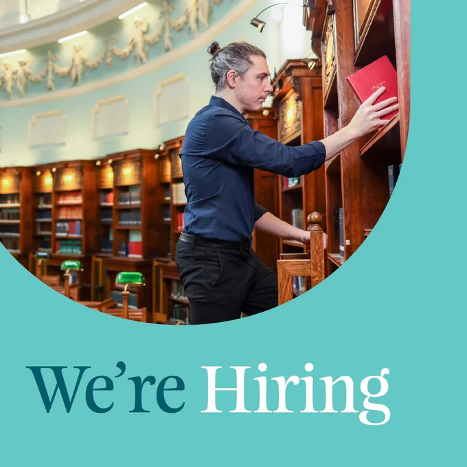 We're hiring graphic text and image of a man stocking a shelf