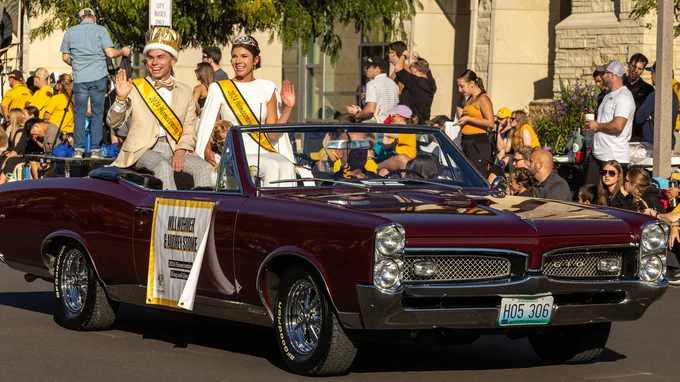 An old car at a parade 