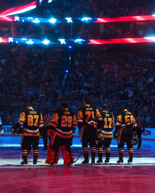 Sidney Crosby, Marc-Andre Fleury, Evgeni Malkin, Bryan Rust and Kris Letang standing together for the anthem.