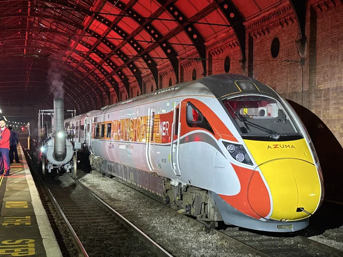 Locomotion No.1 (replica) and Azuma 801207 ‘Darlington’ side by side in Darlington station
