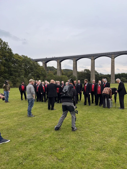 Lining up for a video beneath the Aqueduct