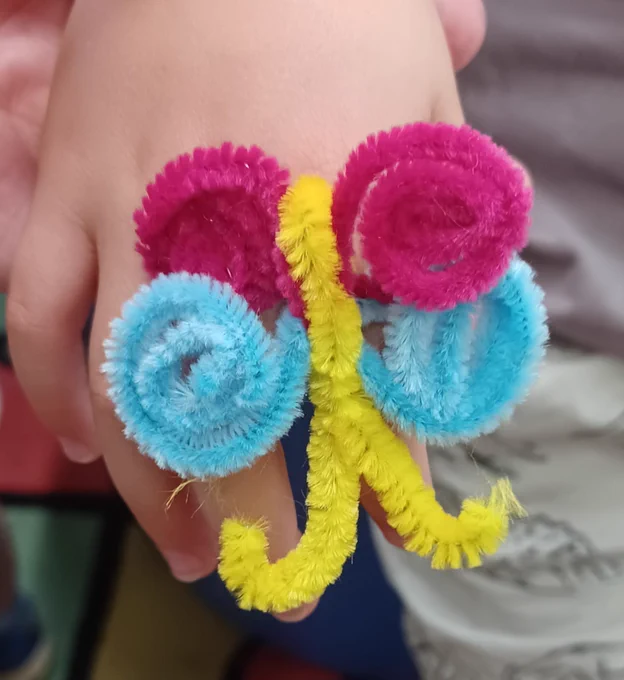 Photograph of a butterfly pipe cleaner craft.