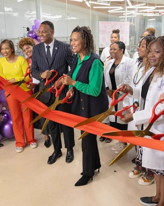 A giant ribbon is cut in the facility