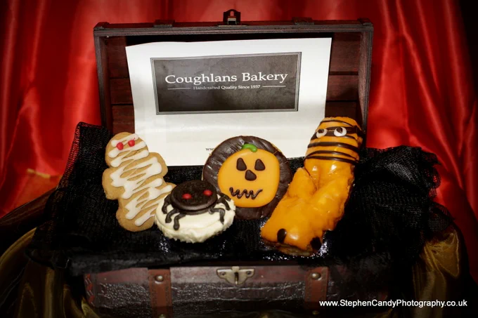 Coughlans Bakery's Halloween cakes and biscuits, in a treasure chest.